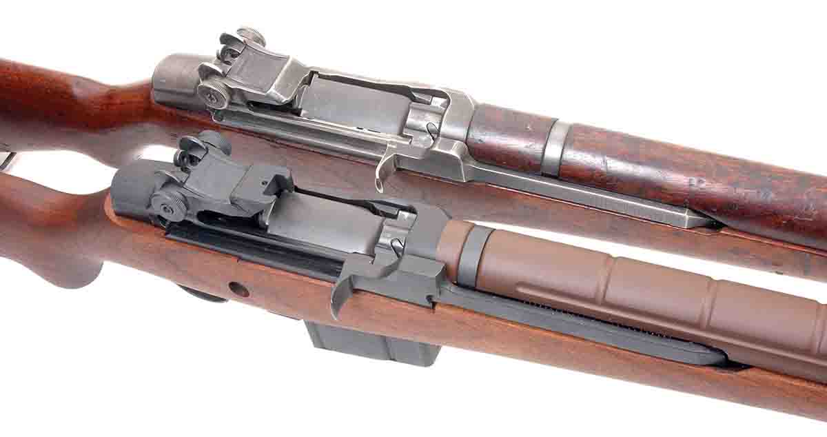 The M14 at bottom (actually this one is a M1A by Springfield Armory) and M1 Garand (top) are closely related in design.